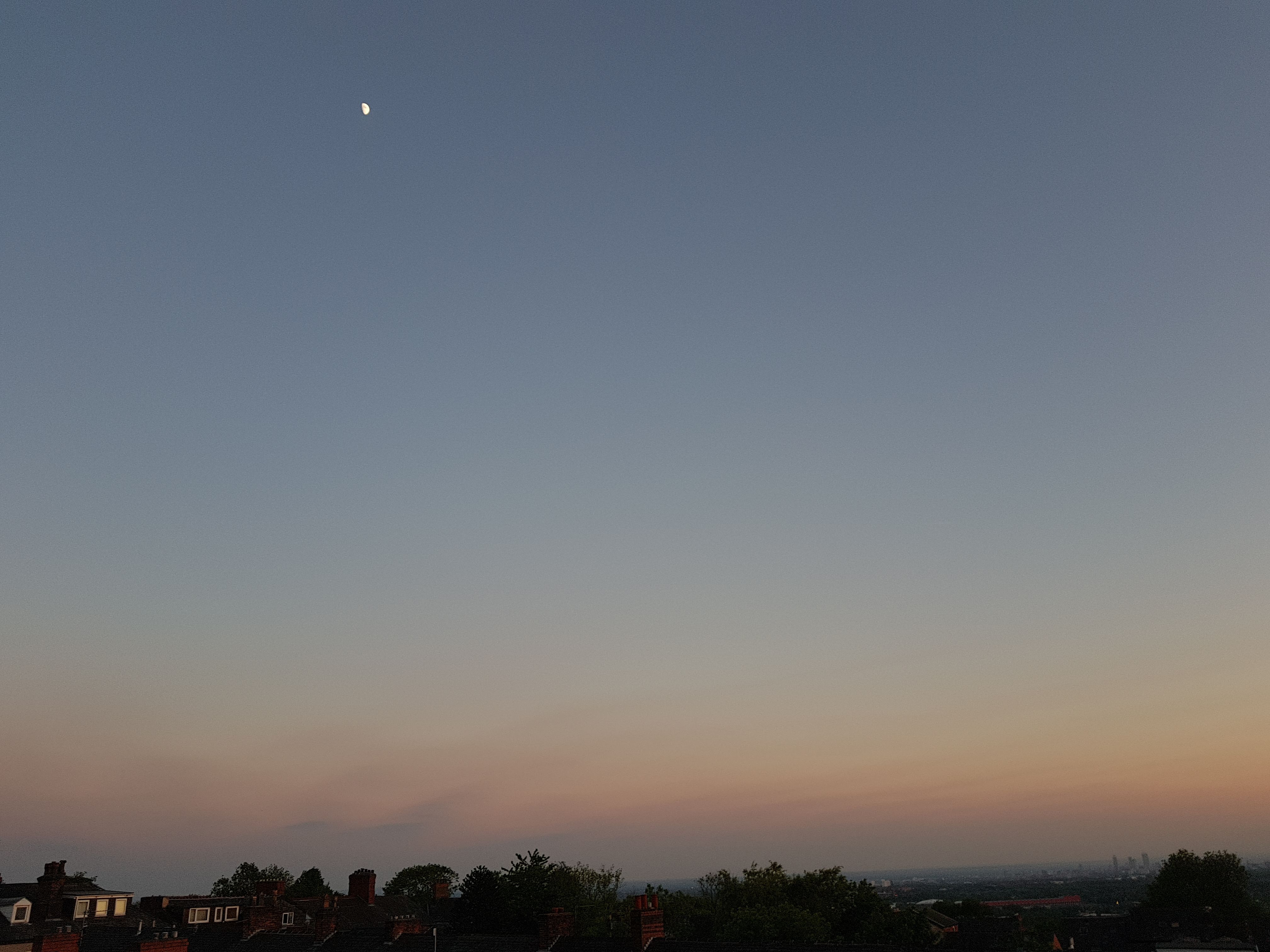 Half moon just before sunset on the 7th of Ramadan